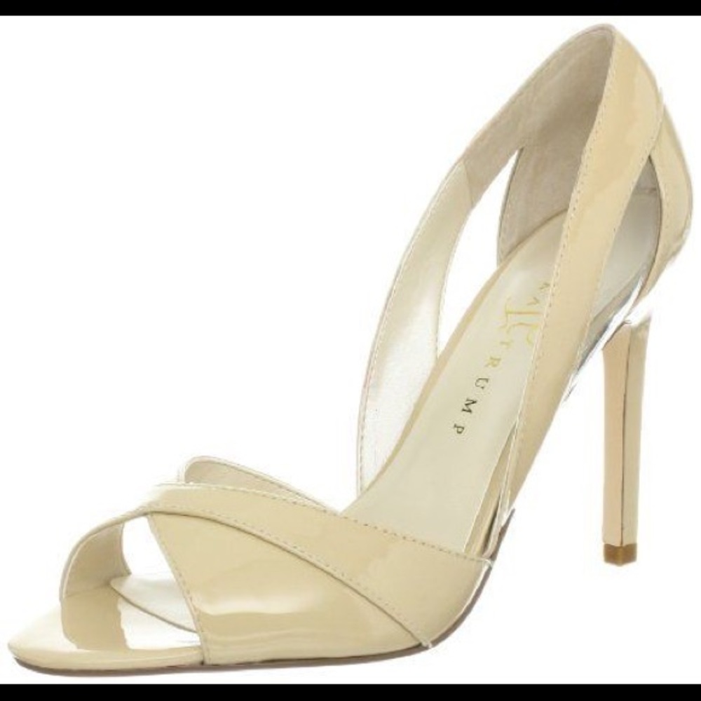 New and never worn. Nude Patent peak-a- boo heel